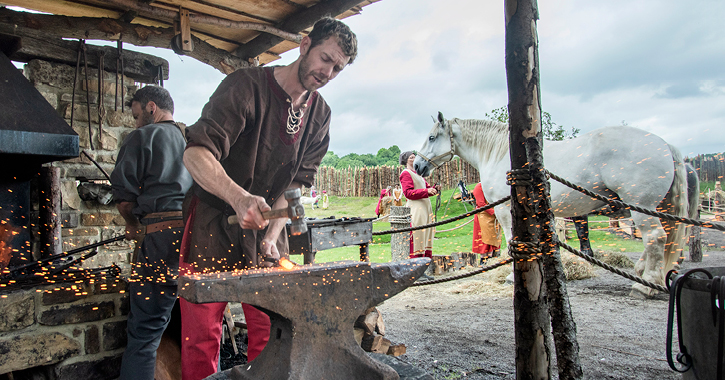 black smith working at the Viking Village in Kynren, County Durham.